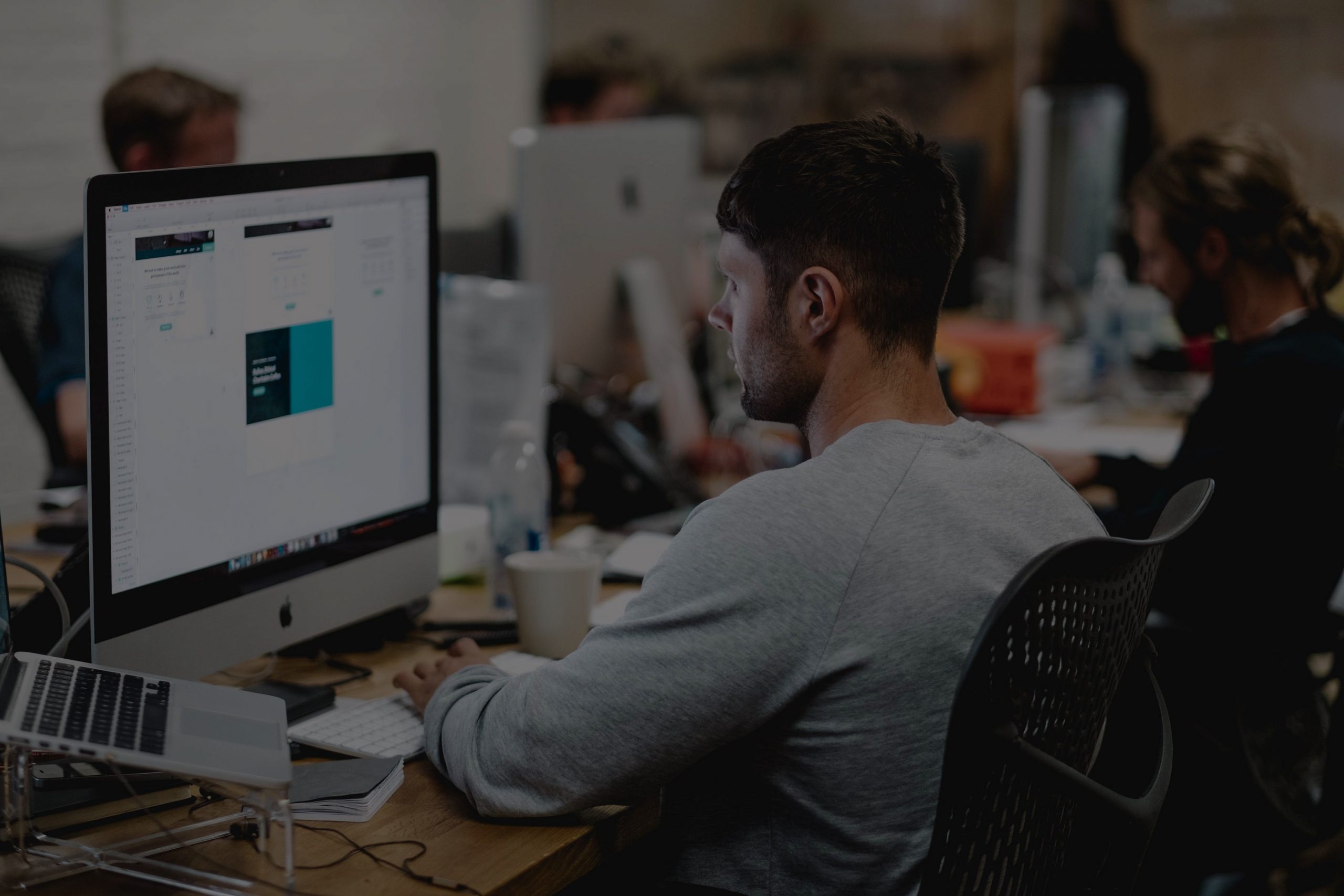 Developer working on marketing automation at a desk